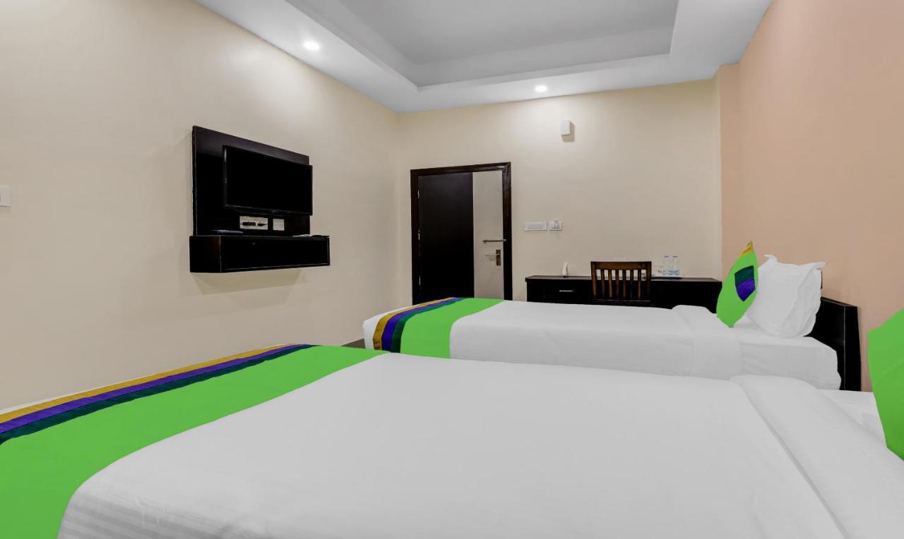 Treebo Hotel Mobi Vip Airport Гувахати Экстерьер фото